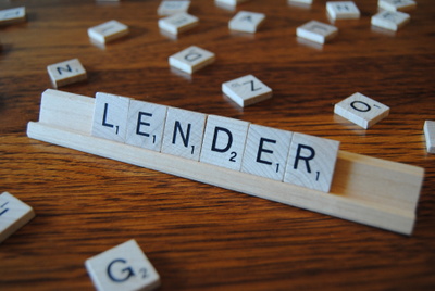 Scrabble pieces spell out lender