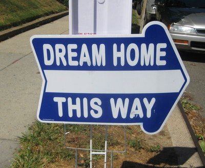 Dream home this way sign